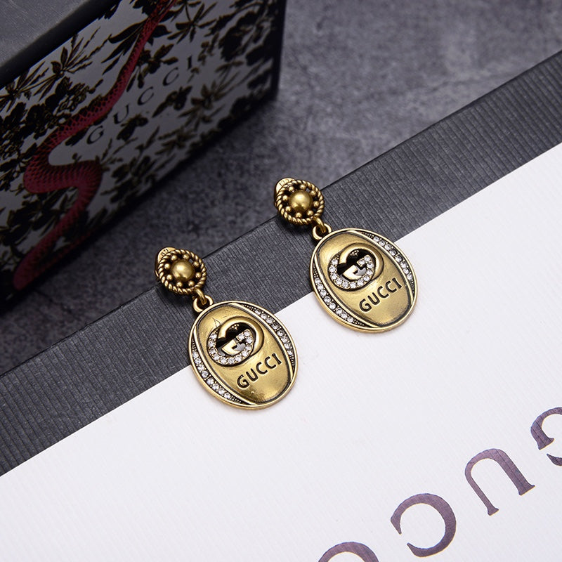 G u c c I earrings